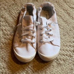 White sneakers slide on